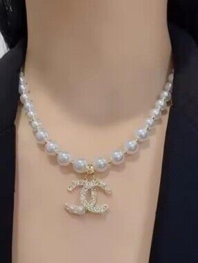 Pearl Necklace with Gold Interlocking Pendant - White